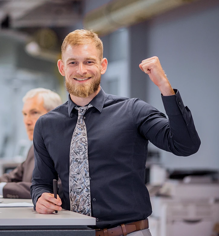 Business founder celebrating successful registration